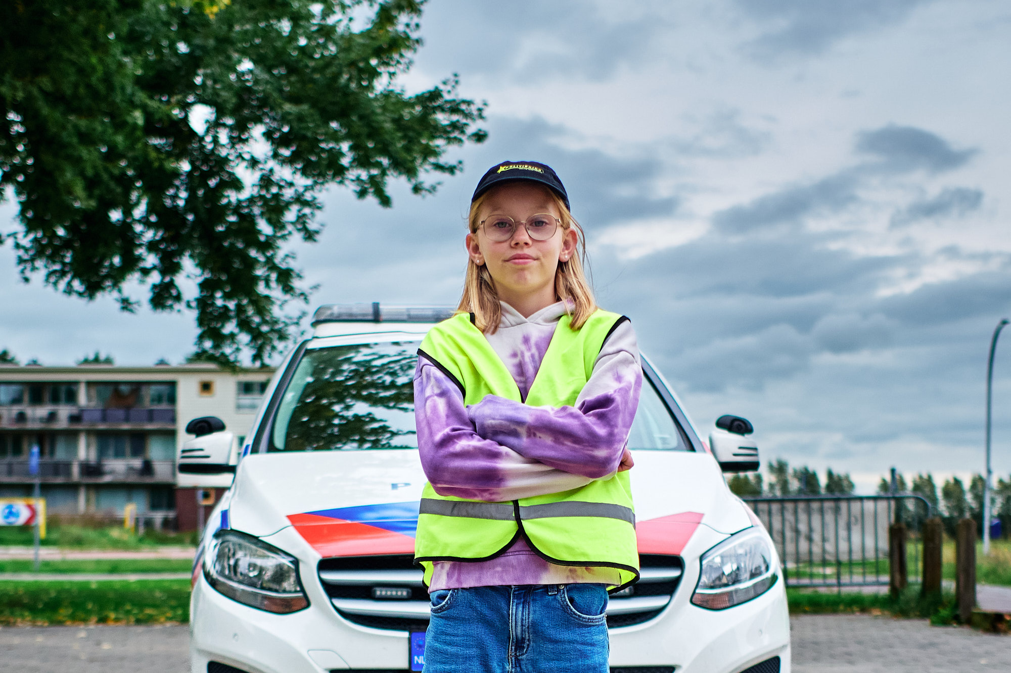 Portret van een kindervrijwilliger bij de kinderpolitie uit Zwolle, gefotografeerd door Anke Olthof.